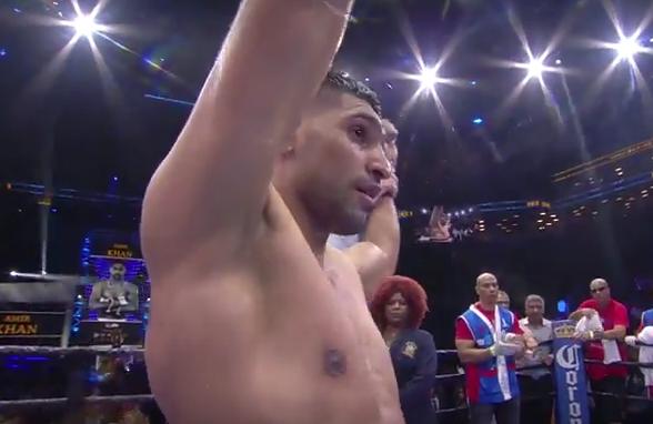 Khan vs Algieri - Amir Khan celebrates victory over Chris Algieri